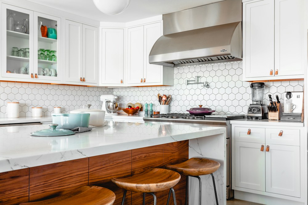 Bright kitchen with a spacious island and light cabinetry